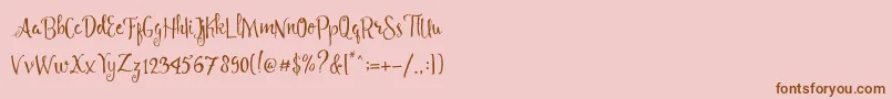 Angelia Script Free Demo Font – Brown Fonts on Pink Background