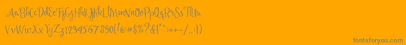 Fonte Angelia Script Free Demo – fontes cinzas em um fundo laranja