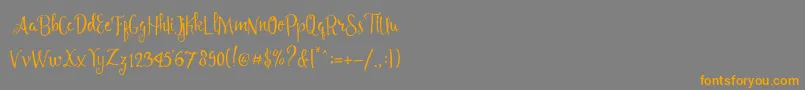 Angelia Script Free Demo Font – Orange Fonts on Gray Background