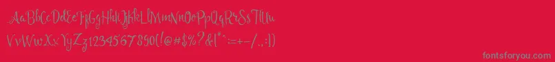 Angelia Script Free Demo Font – Gray Fonts on Red Background