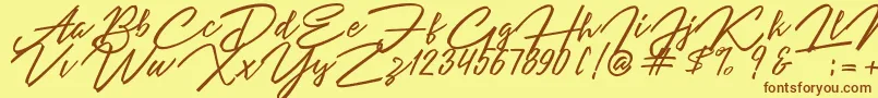 More about Angelina Script Font Angelina Script Font – Brown Fonts on Yellow Background