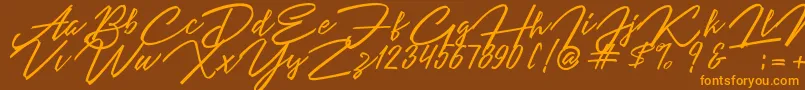 Angelina Script-Schriftart – Orangefarbene Schriften auf braunem Hintergrund