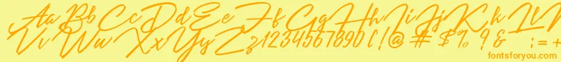 Angelina Script Font – Orange Fonts on Yellow Background