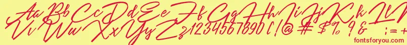 Angelina Script Font – Red Fonts on Yellow Background