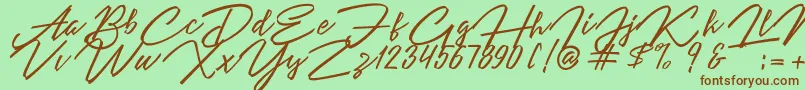 Angelina Script-Schriftart – Braune Schriften auf grünem Hintergrund