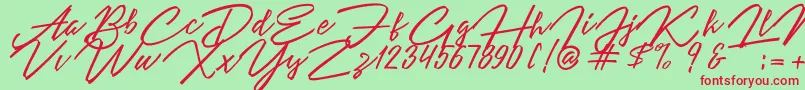 Angelina Script-Schriftart – Rote Schriften auf grünem Hintergrund