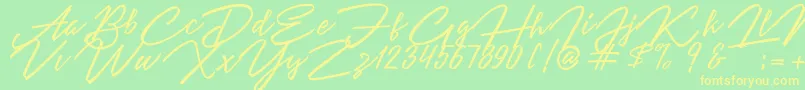 Angelina Script Font – Yellow Fonts on Green Background