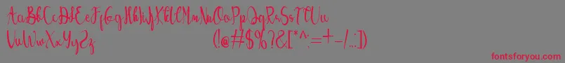 フォントAngelina – 赤い文字の灰色の背景