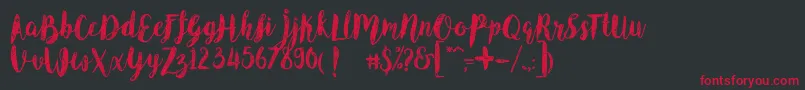 Angeline Vintage Demo-Schriftart – Rote Schriften auf schwarzem Hintergrund