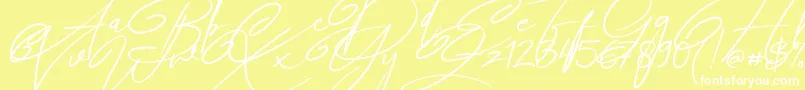 Czcionka Angers Script – białe czcionki na żółtym tle