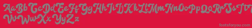 フォントAnggada FREE – 赤い背景に灰色の文字