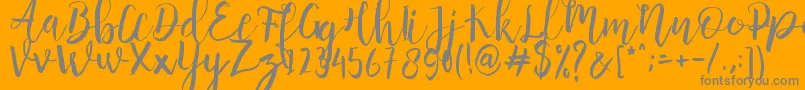 Anggelica Merona  -Schriftart – Graue Schriften auf orangefarbenem Hintergrund