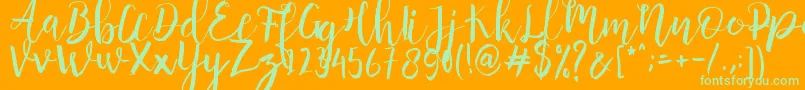 Anggelica Merona  -Schriftart – Grüne Schriften auf orangefarbenem Hintergrund