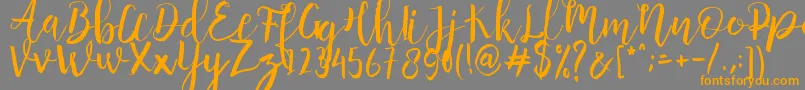 Anggelica Merona  -Schriftart – Orangefarbene Schriften auf grauem Hintergrund