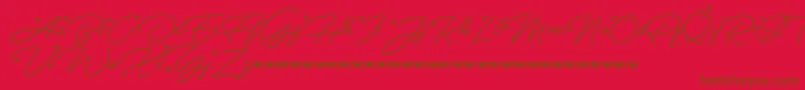 Fonte Anggrek   Script Font Demo – fontes marrons em um fundo vermelho