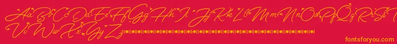 Fonte Anggrek   Script Font Demo – fontes laranjas em um fundo vermelho