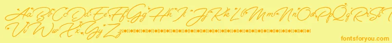 Anggrek   Script Font Demo Font – Orange Fonts on Yellow Background