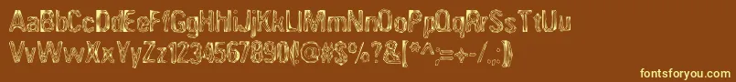 ANGIA   -fontti – keltaiset fontit ruskealla taustalla