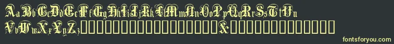 Anglo Text Font – Yellow Fonts on Black Background