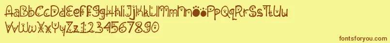 Animal Insting Font – Brown Fonts on Yellow Background