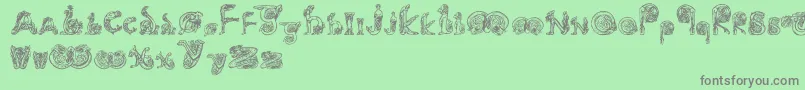 fuente Animals – Fuentes Grises Sobre Fondo Verde