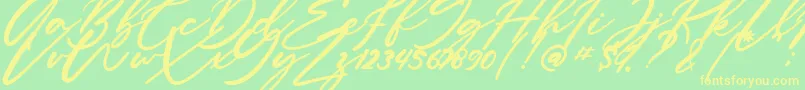 Anitto Font – Yellow Fonts on Green Background