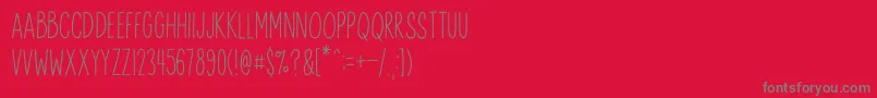 AnitypeRedwood 2-fontti – harmaat kirjasimet punaisella taustalla