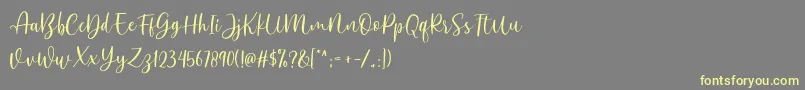 Anjani DEMO Font – Yellow Fonts on Gray Background