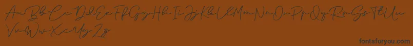 Anjel Signature For Personal Use Font – Black Fonts on Brown Background