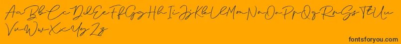 Anjel Signature For Personal Use-fontti – mustat fontit oranssilla taustalla