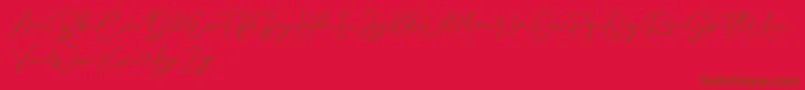 フォントAnjel Signature For Personal Use – 赤い背景に茶色の文字