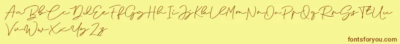 Saiba mais sobre a fonte Anjel Signature For Personal Use Fonte Anjel Signature For Personal Use – fontes marrons em um fundo amarelo
