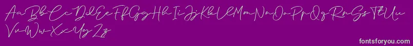 フォントAnjel Signature For Personal Use – 紫の背景に緑のフォント