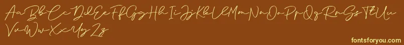 Anjel Signature For Personal Use Font – Yellow Fonts on Brown Background