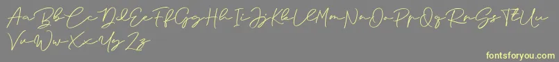 Anjel Signature For Personal Use-Schriftart – Gelbe Schriften auf grauem Hintergrund