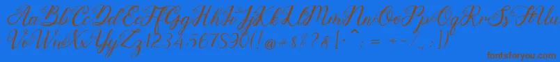 Anjelina Font – Brown Fonts on Blue Background