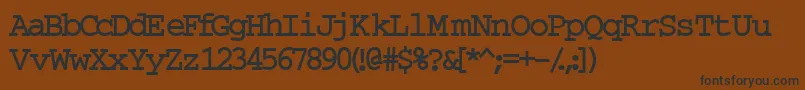 InuktitutlightsskBold Font – Black Fonts on Brown Background