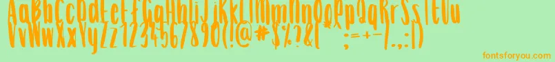 AnnaKay Font – Orange Fonts on Green Background