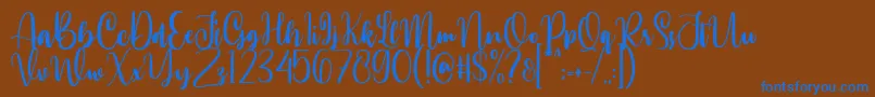 Weitere Informationen zur Annamellia-Schriftart Annamellia-Schriftart – Blaue Schriften auf braunem Hintergrund