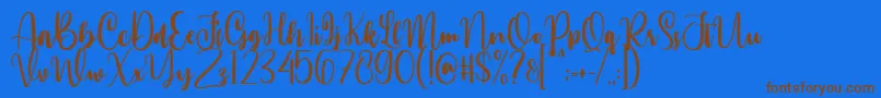 Annamellia Font – Brown Fonts on Blue Background