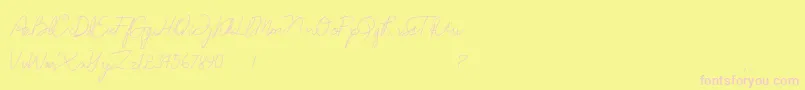 Anndanlusia-fontti – vaaleanpunaiset fontit keltaisella taustalla