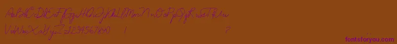 Anndanlusia-fontti – violetit fontit ruskealla taustalla
