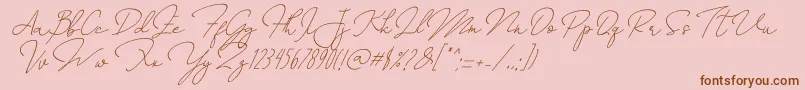 Annisa   Slant-Schriftart – Braune Schriften auf rosa Hintergrund