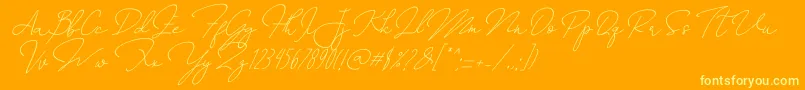 Annisa   Slant-Schriftart – Gelbe Schriften auf orangefarbenem Hintergrund