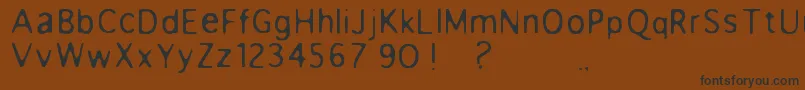 フォントAnorexia – 黒い文字が茶色の背景にあります