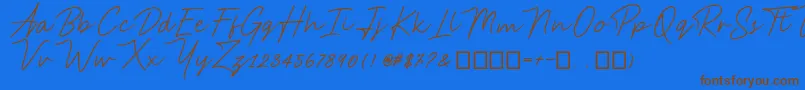 フォントAnsteryScript – 茶色の文字が青い背景にあります。