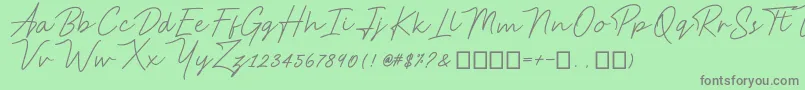 フォントAnsteryScript – 緑の背景に灰色の文字