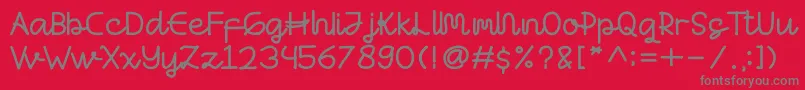 フォントAntashalam Regular – 赤い背景に灰色の文字