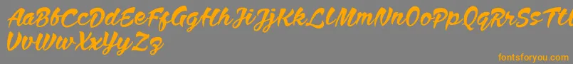 Anthem Nasney Font – Orange Fonts on Gray Background