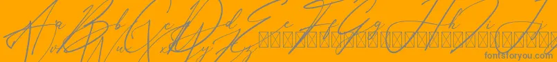 AnthoniSignature-Schriftart – Graue Schriften auf orangefarbenem Hintergrund